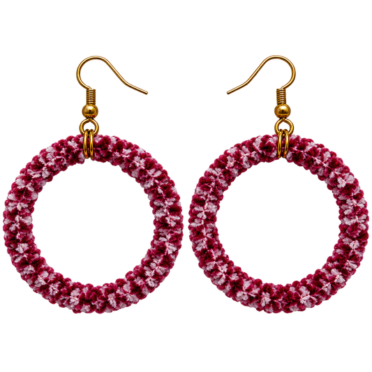 Handmade wool-wrapped hoop earrings with soft wool fibers in burgundy, raspberry, and blush pink