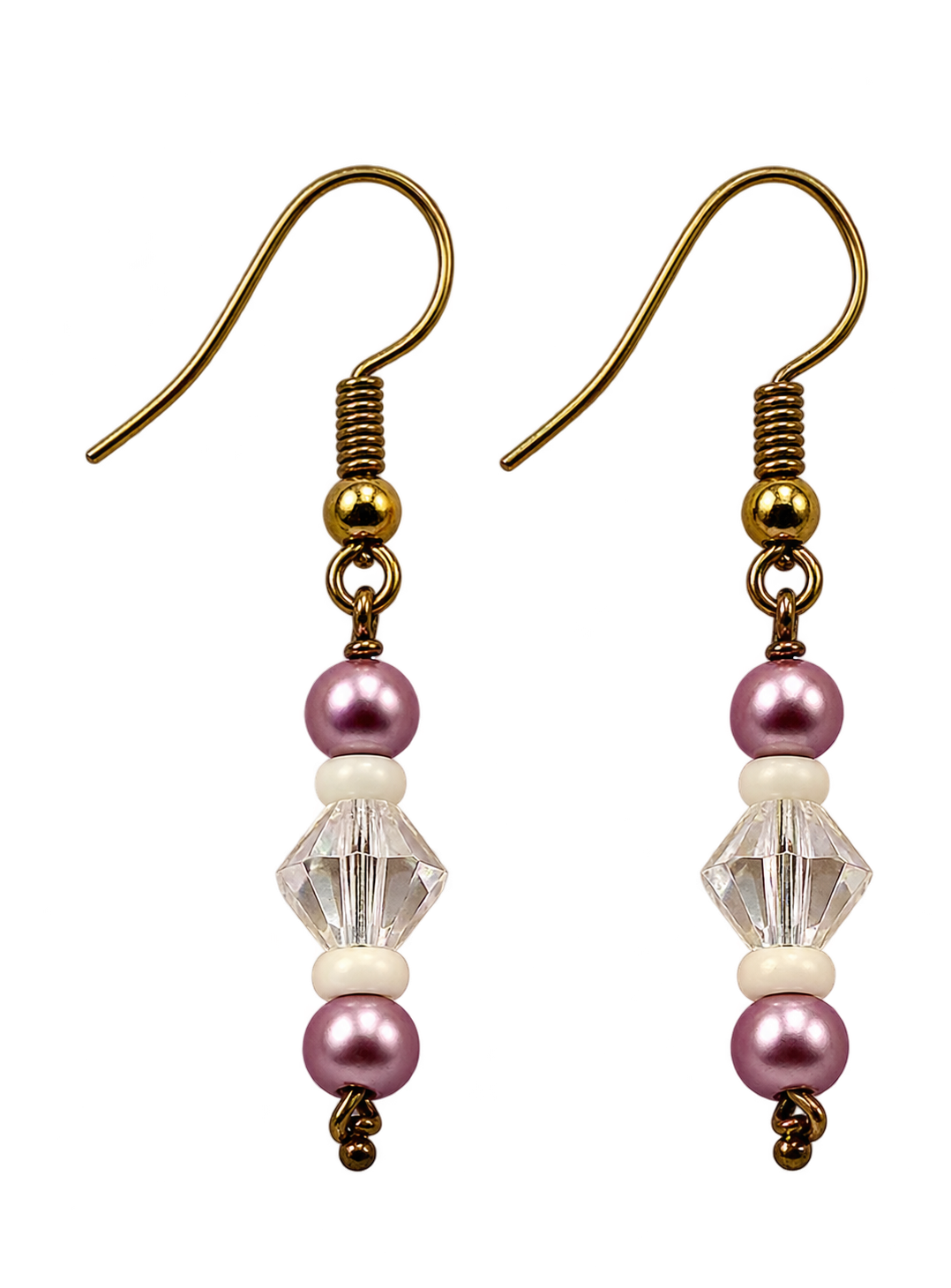 A pair of drop earrings with antique gold fishhook wires, a small gold bead, a clear faceted bead, and pink pearl-like beads on a white background.